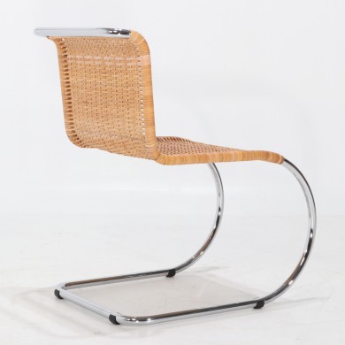CURVED wicker chair